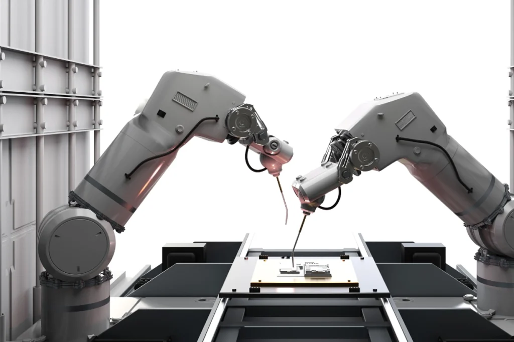 Two robotic arms collaborating in a manufacturing process