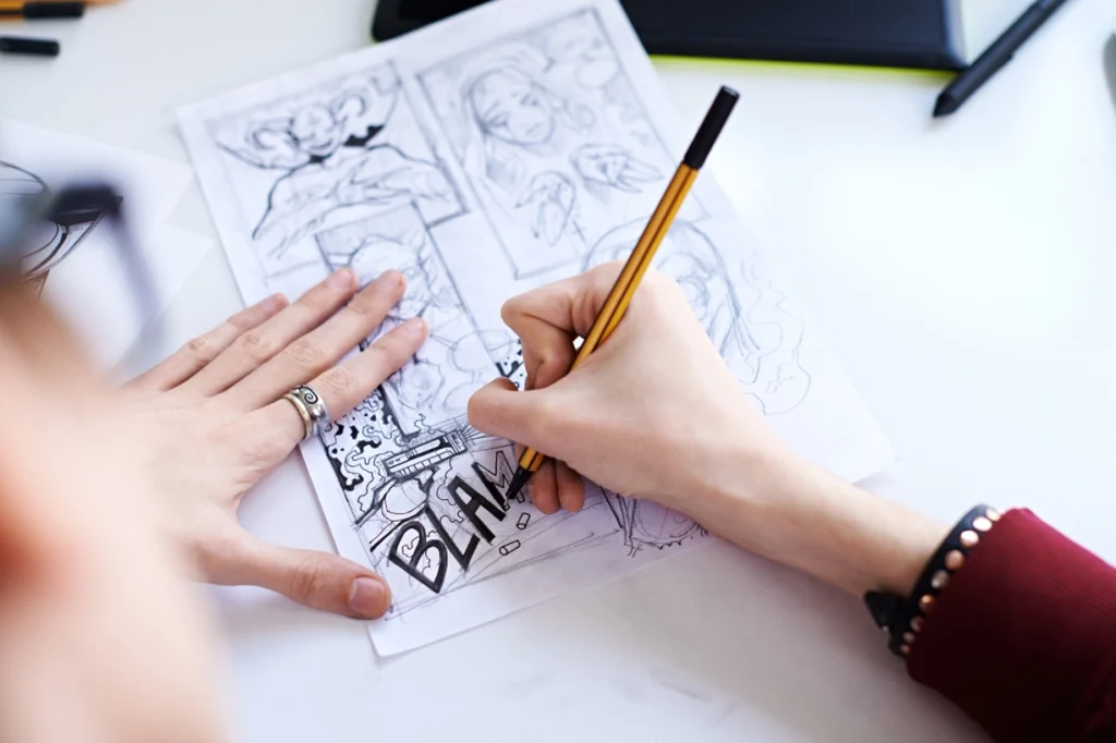 Artist drawing a comic on paper