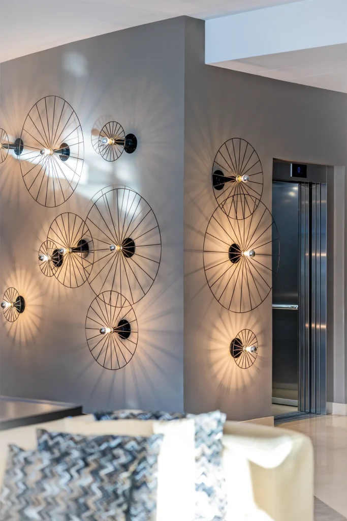 Vertical surface adorned with lights, providing a warm, vibrant glow