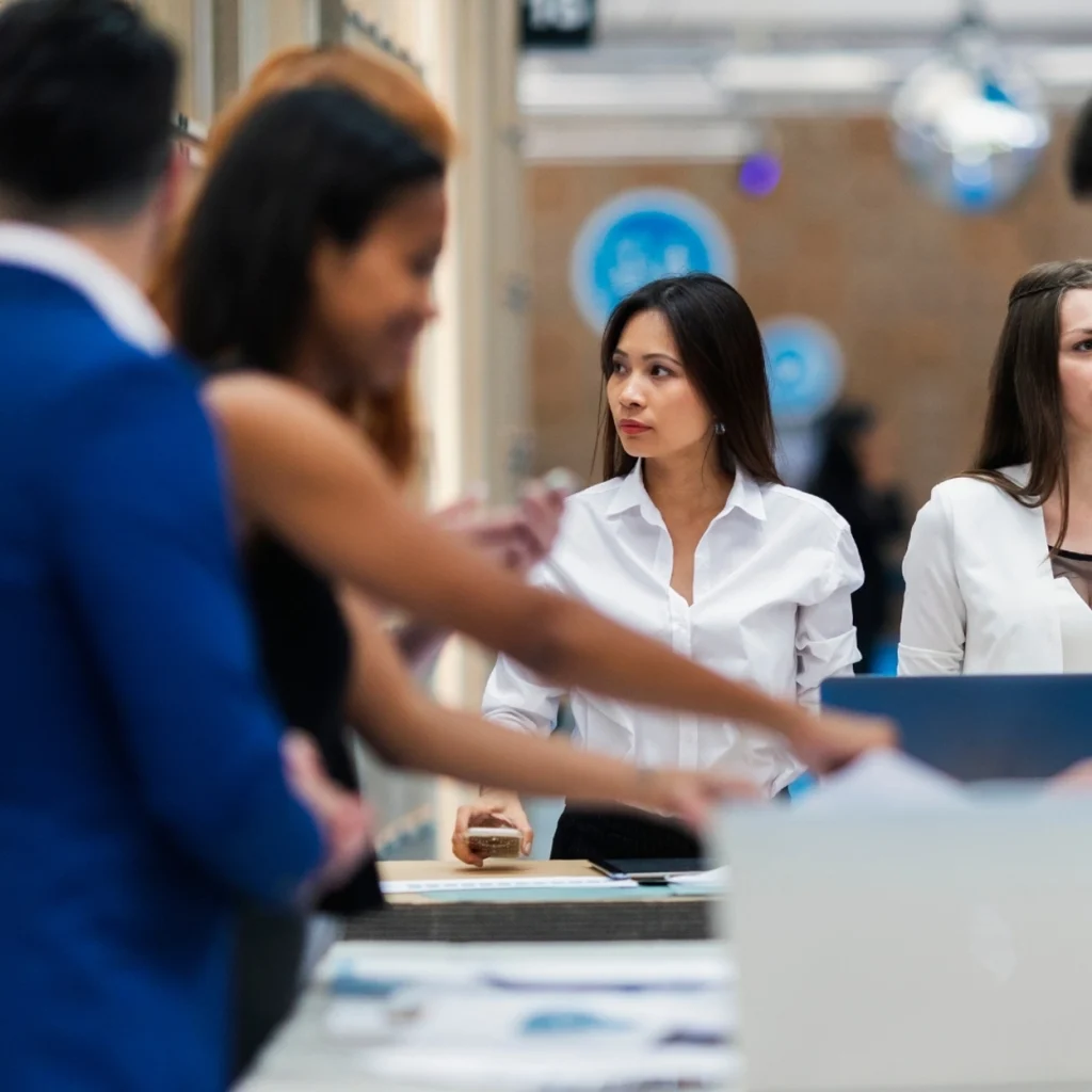 Group of professionals at a business meeting, discussing ideas.