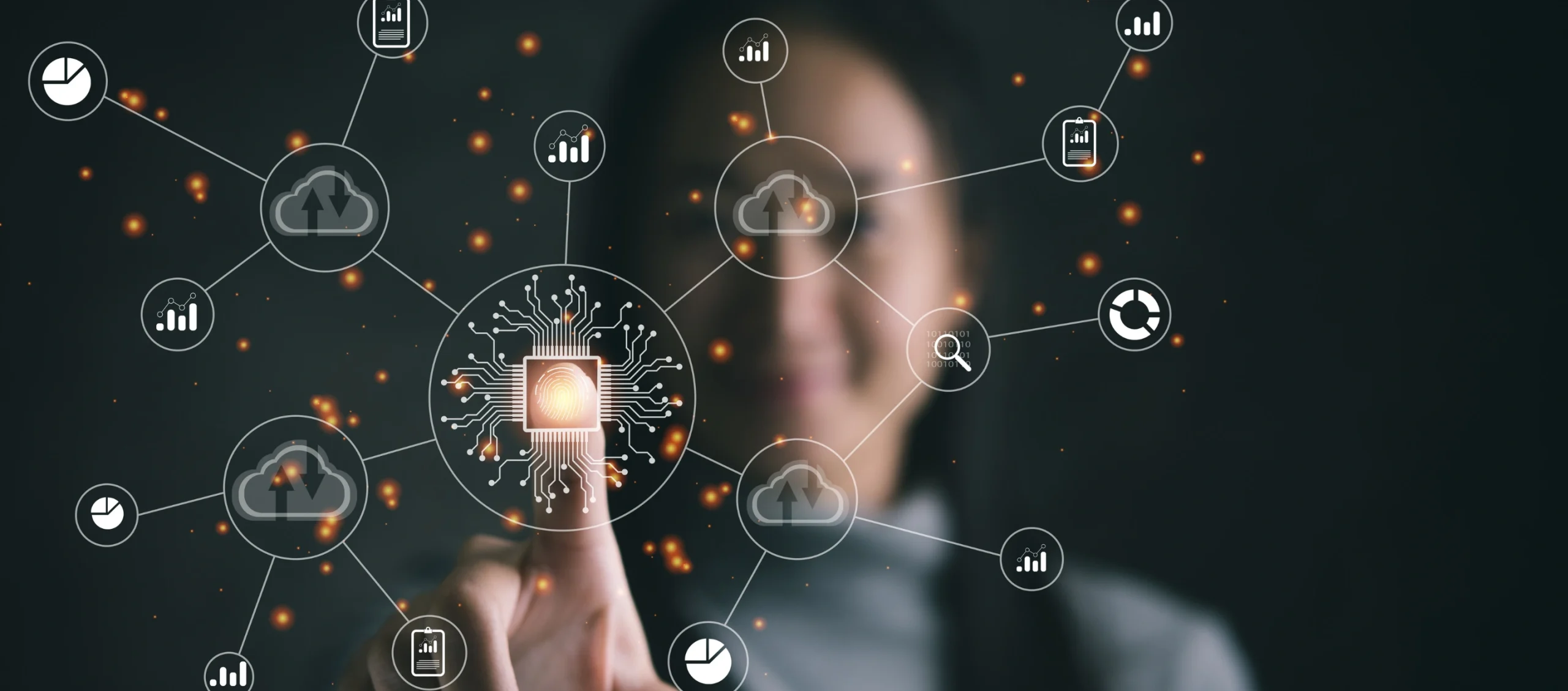 Person interacting with data graphics and digital technology.
