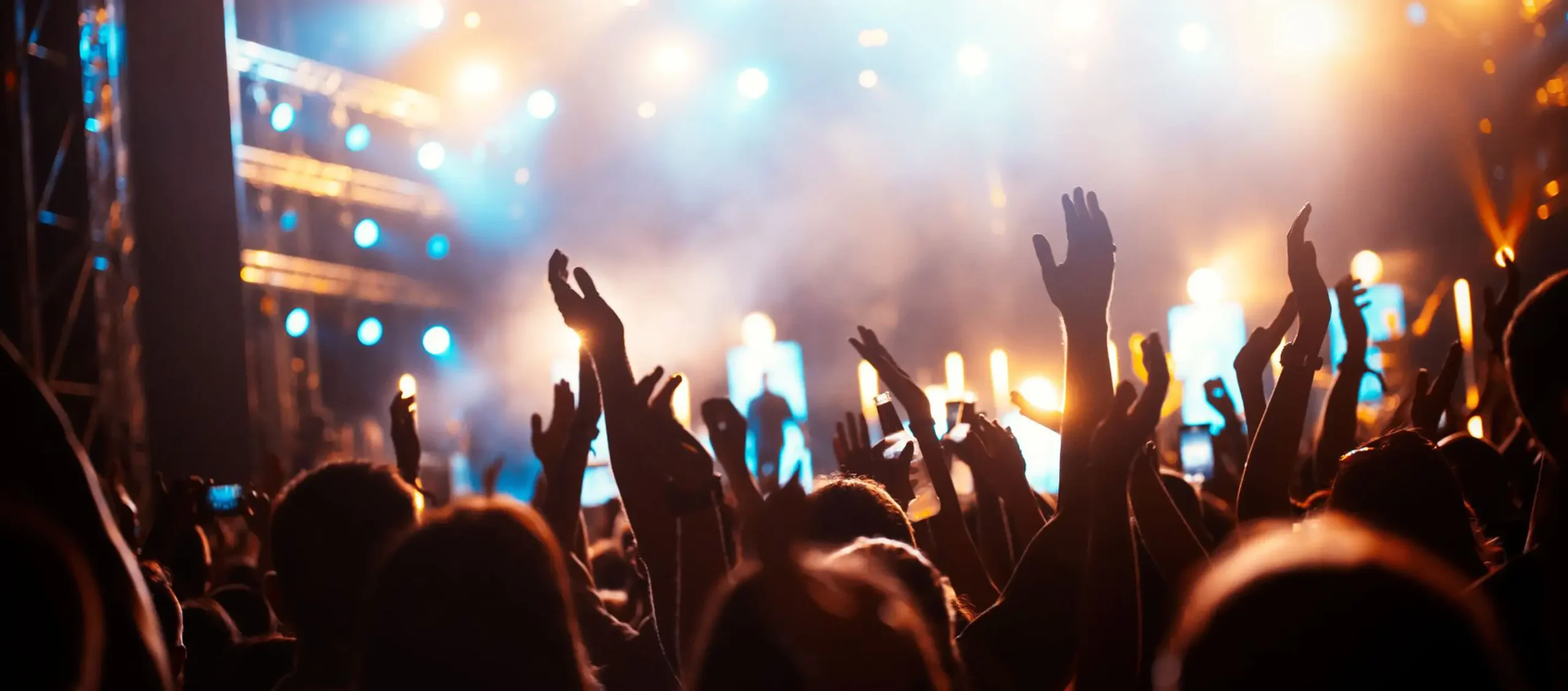 Vibrant atmosphere at a concert with bright lights