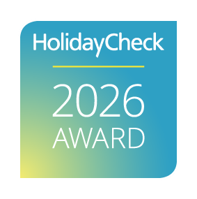 HolidayCheck 2026 Award en fondo degradado azul y amarillo.