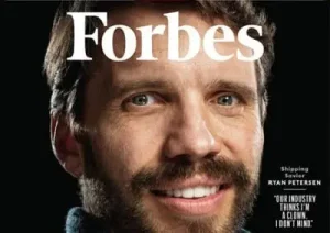 Man smiling on a Forbes magazine cover, text beside him.