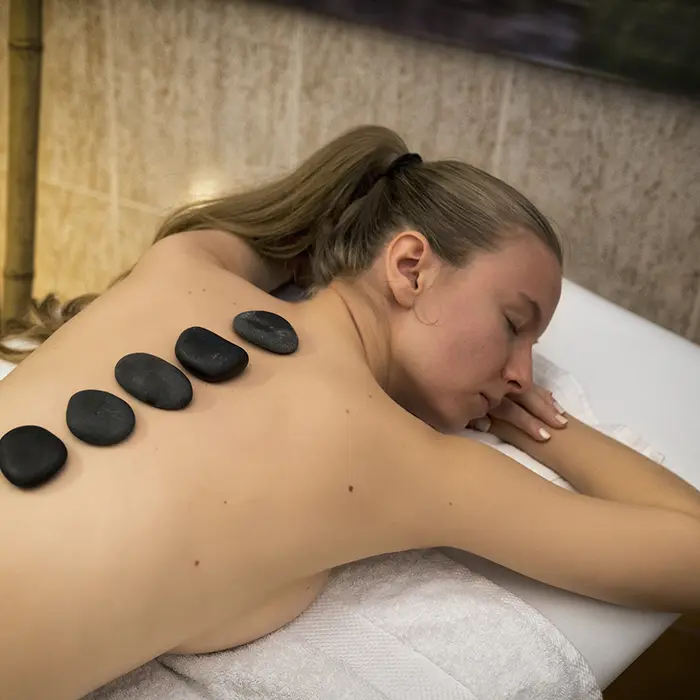 Woman receiving geothermal therapy