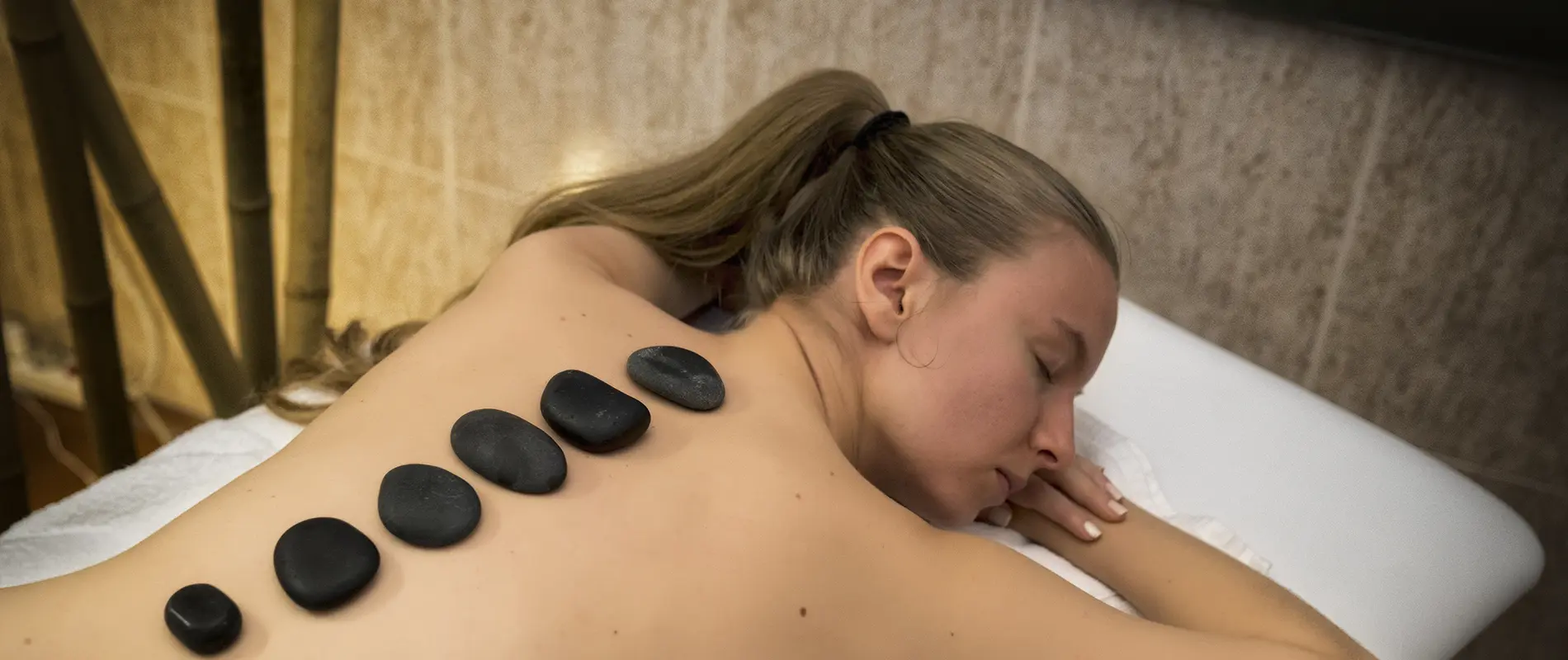 Woman receiving geothermal therapy