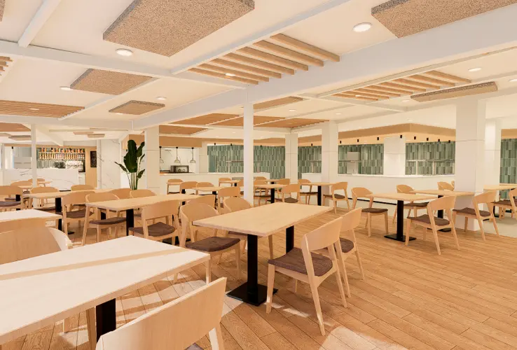Comedor moderno con mesas y sillas de madera clara, iluminación cálida y techo decorado, ambiente amplio y luminoso.