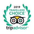 Logo de "Tripadvisor Traveller's Choice 2019" con un laurel verde y un búho.