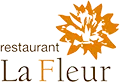 Logo del "Restaurant La Fleur" con un diseño de flor anaranjada sobre fondo gris.