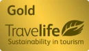 Gold Travelife logo for sustainability in tourism.