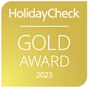 HolidayCheck Gold Award 2023 badge in gold color.