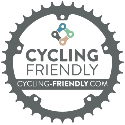 Logo de "Cycling Friendly" con engranaje y enlace web.