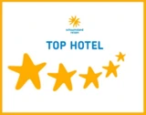 "Top Hotel" award with five gold stars and a sunny logo.