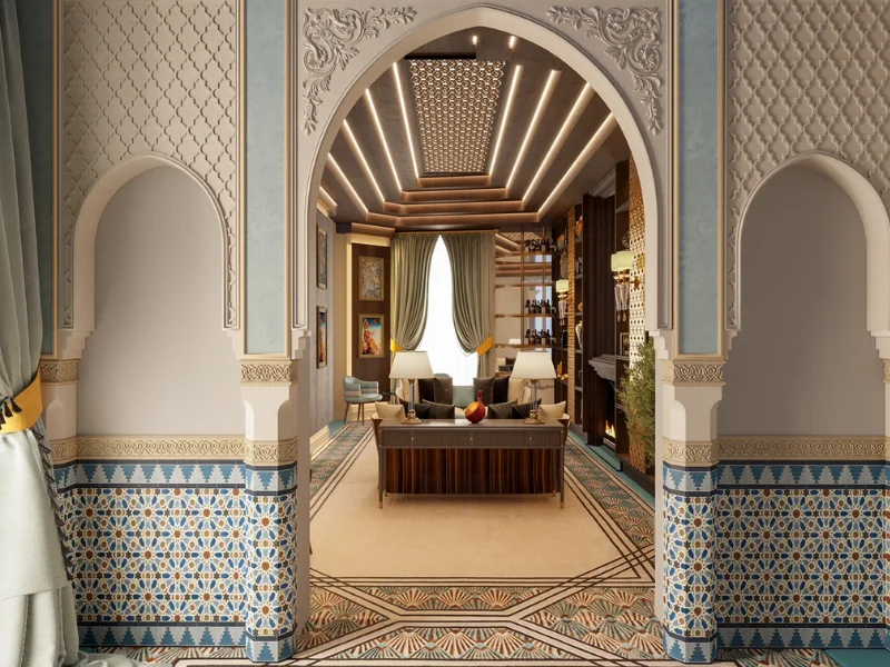Sala elegante con arcos de estilo &aacute;rabe y detallados mosaicos en las paredes.