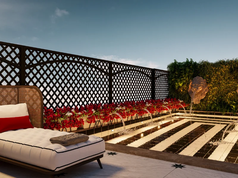 Terraza con chaise longue, flores rojas y fuente en un dise&ntilde;o moderno.