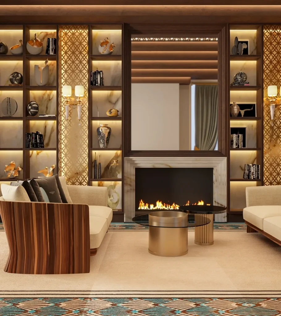 Sala moderna con chimenea, estanter&iacute;as iluminadas y sof&aacute;s beige.