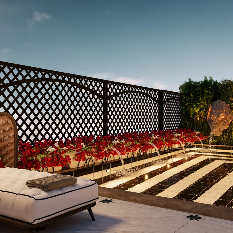 Terraza con sof&aacute;, flores y peque&ntilde;a fuente sobre piso a rayas. Ambiente sereno.