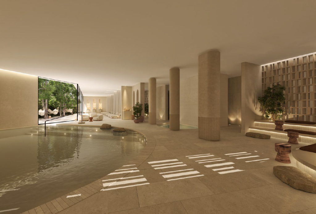 Spacious modern room with a large indoor pool, serene lighting, and plants.