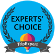 Blue TripExpert badge with laurel and hot air balloon.