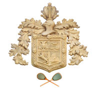 Escudo con ornamentos, hojas y lupas cruzadas abajo.