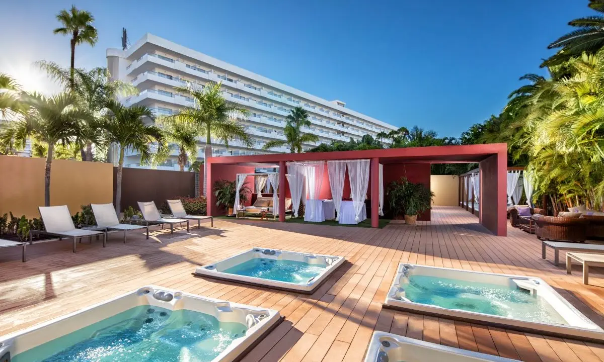 Wellness area at Gran Canaria Princess hotel featuring four outdoor jacuzzis and a massage area