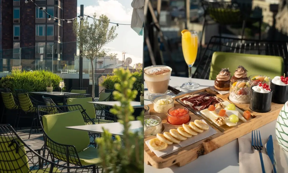 Dachterrasse und am Tisch serviertes Frühstück