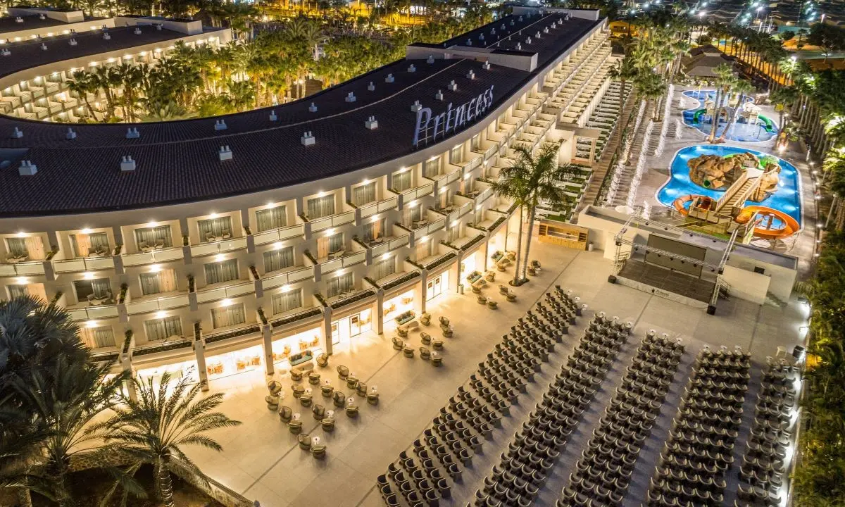 Night-time aerial view of Maspalomas Princess with the outdoor Theatre Bar and children&rsquo;s water park