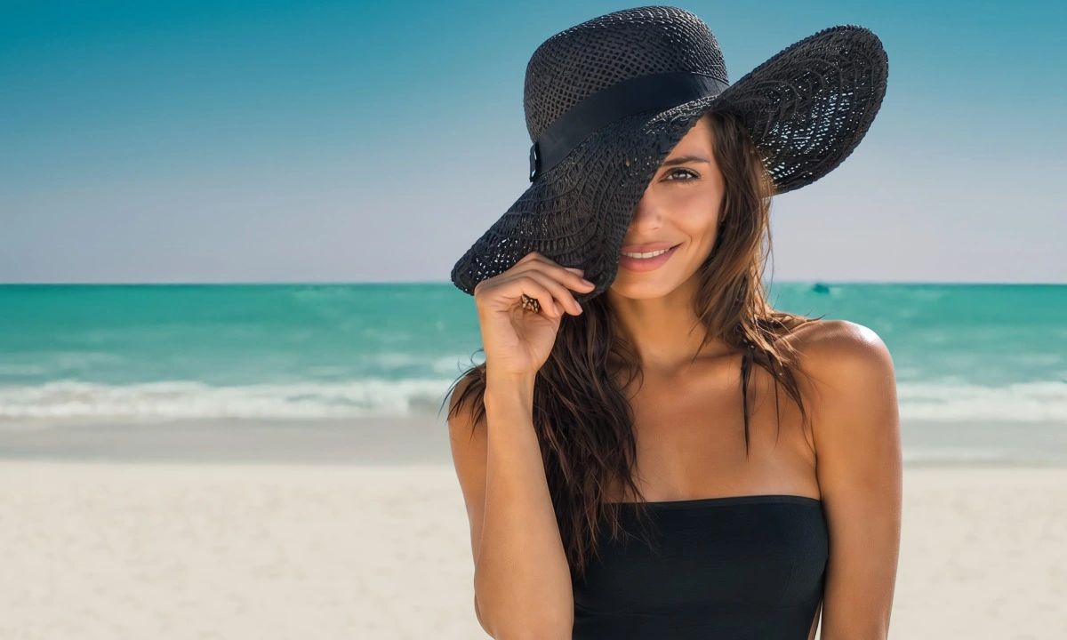 A woman with a hat in the Caribbean