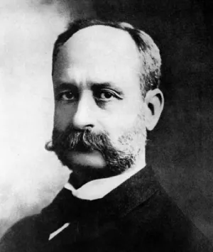 Retrato en blanco y negro de un hombre con bigote y barba.