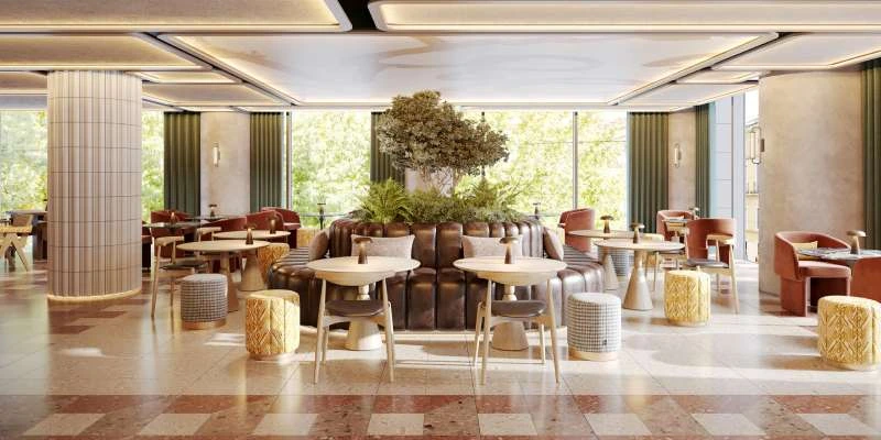 Caf&eacute; moderno com mesas, cadeiras e plantas no centro.