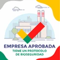 Imagen de una f&aacute;brica con texto: "Empresa Aprobada, protocolo de bioseguridad".