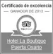 Certificado de excelencia 2013 de TripAdvisor, otorgado a Hotel La Boutique Puerta Osario.