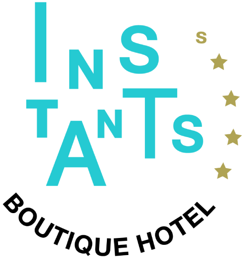 Texto "INSTANTS" con estrellas doradas en el fondo negro.