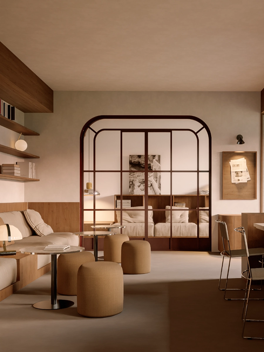Sala moderna con sof&aacute;s, mesas y taburetes en tonos neutros y c&aacute;lidos.
