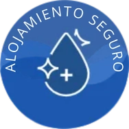 Icono azul de "Alojamiento Seguro" con gota y s&iacute;mbolos de limpieza.