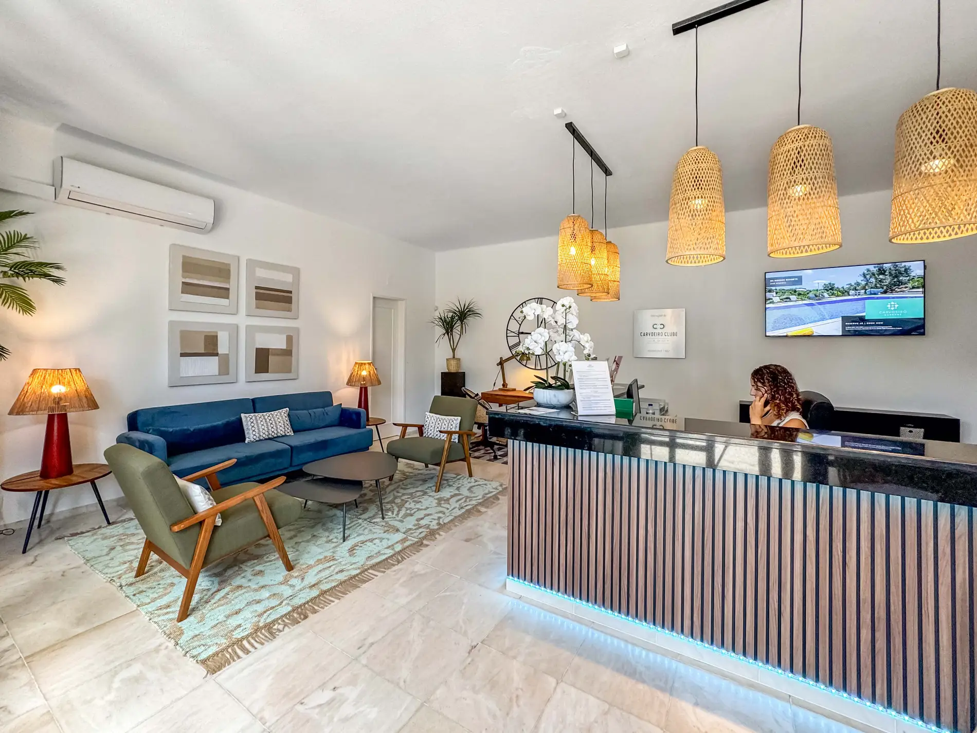 Reception area with modern decor and comfortable seating.
