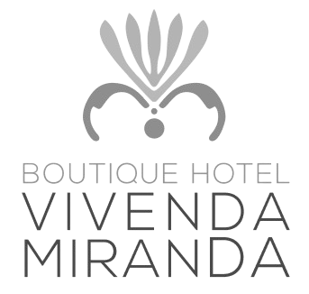 Logo of Boutique Hotel Vivenda Miranda with decorative elements.