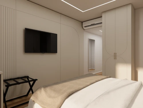 Modern bedroom with TV, air conditioner, and neutral decor.