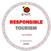 Logo rojo y negro con texto amarillo y rojo en un c&iacute;rculo gris.