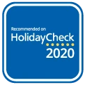 Recomendado HolidayCheck 2020 logo con marco azul.