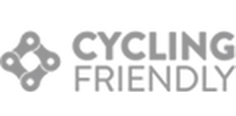 Logo &ldquo;CYCLING FRIENDLY&rdquo; con icono de bicicleta y texto.
