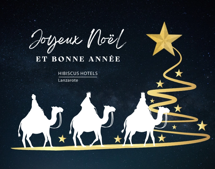 Tres Reyes Magos, estrella y mensaje navide&ntilde;o en franc&eacute;s y logo de hotel.