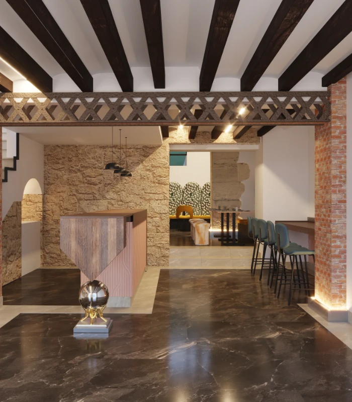 Interior moderno con vigas de madera, pared de ladrillo y barra decorativa.