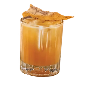Iced coffee in a clear glass with cinnamon-like garnish on top