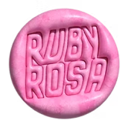 Pink &ldquo;RUBY RUSH&rdquo; round logo badge with glossy texture