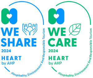 Selo &ldquo;WE SHARE&rdquo; e &ldquo;WE CARE&rdquo; com cora&ccedil;&otilde;es e texto &ldquo;Heart by AHP&rdquo; 2024/2024