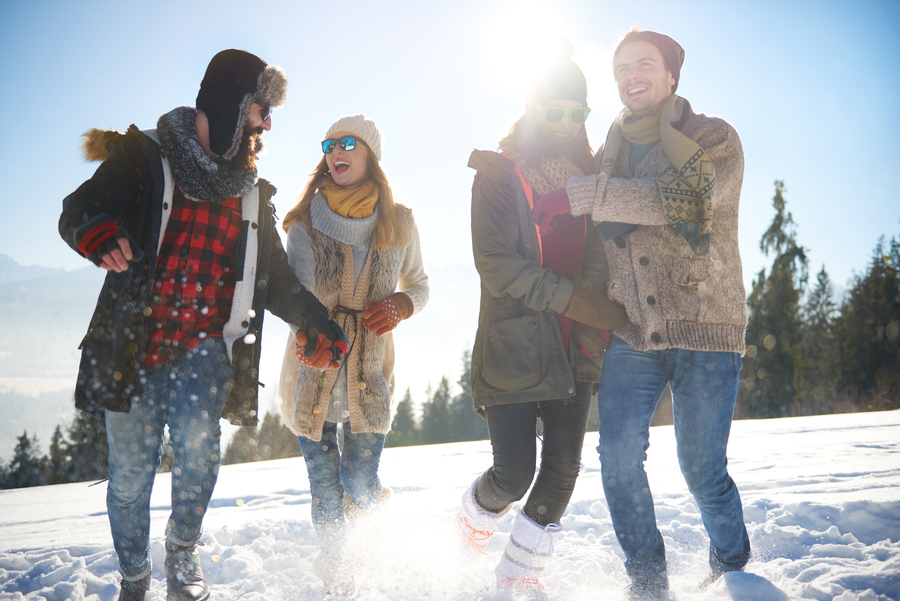 Group of friends during winter vacation in Granada at Sierra Nevada