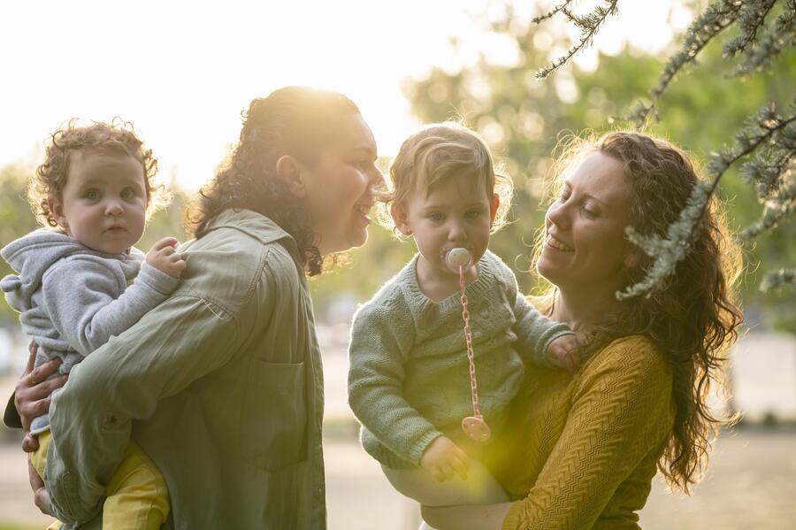 lgbt-family-outdoors-having- fun