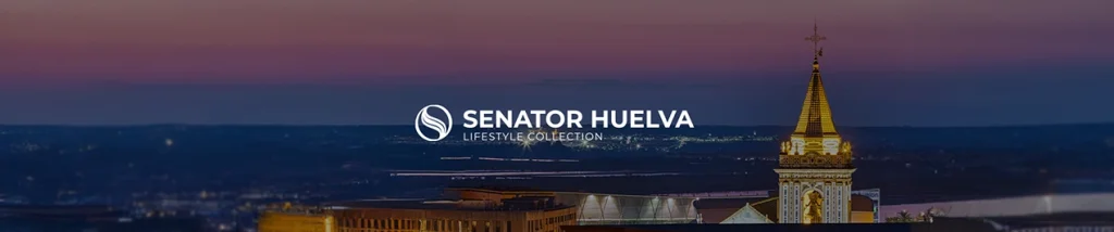 Panorama urbano al atardecer con "Senator Huelva Lifestyle Collection".