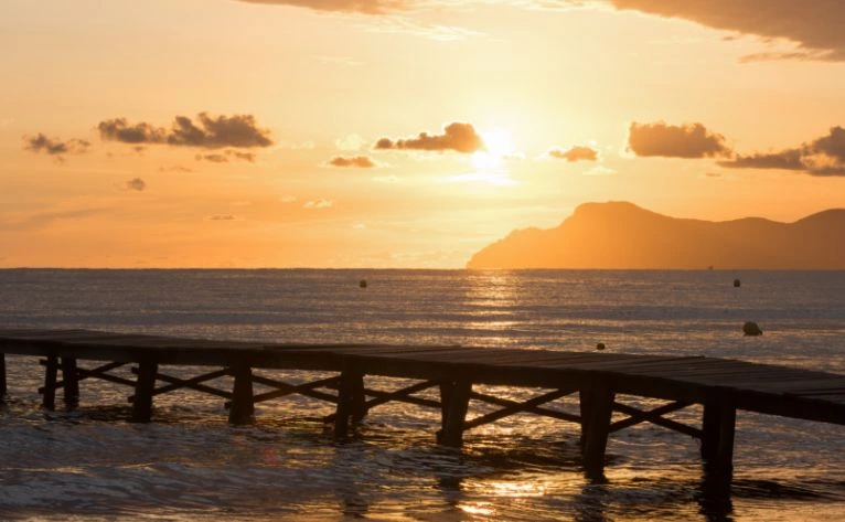 puesta de sol playa de muro